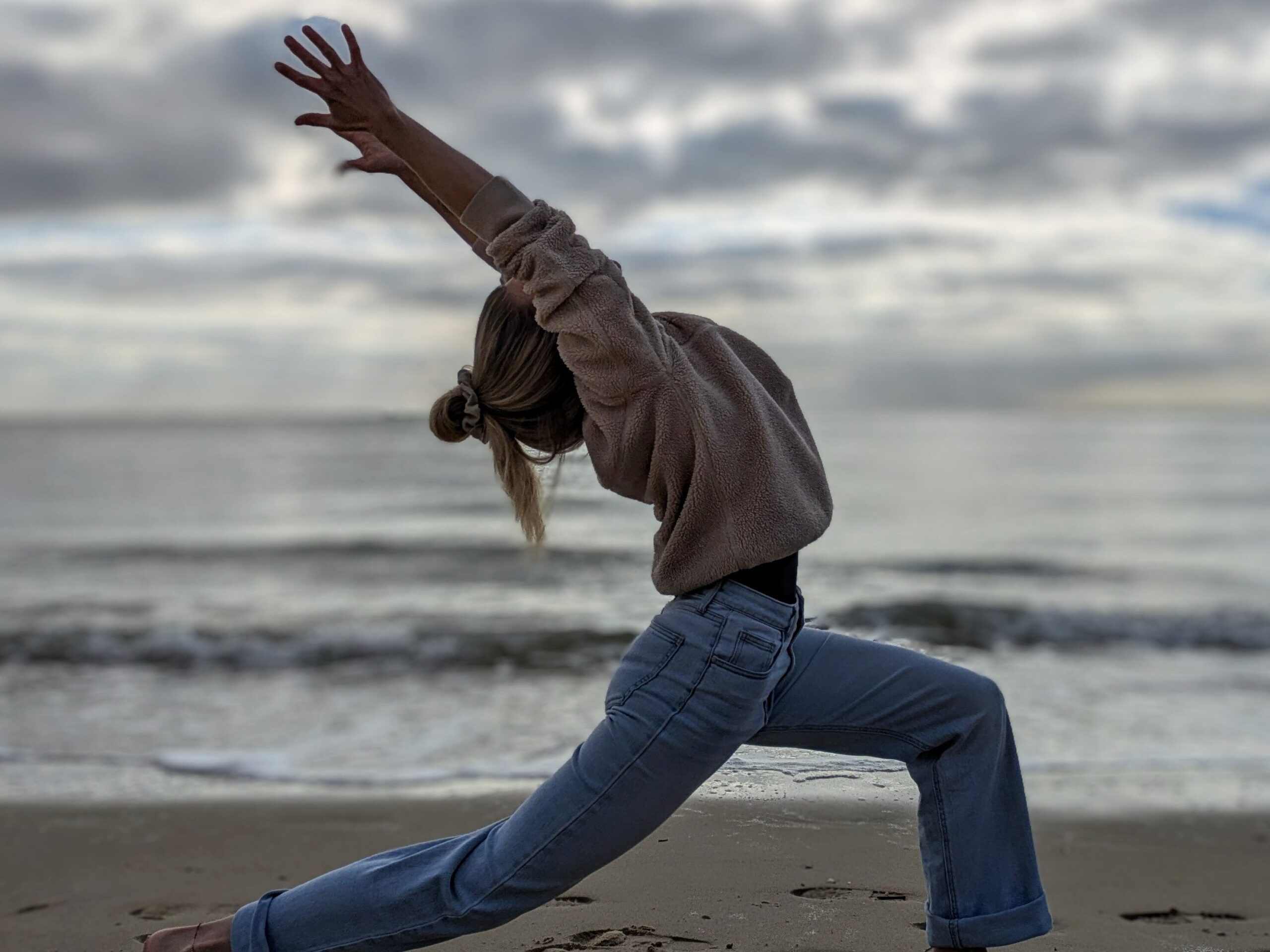 yogapose am Meer